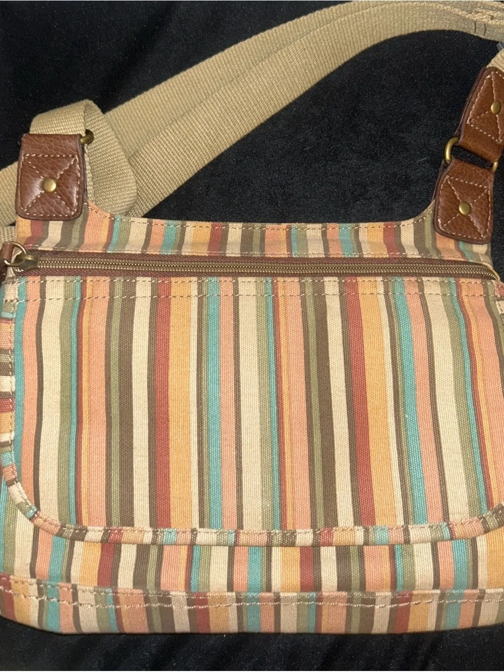 Relic Messenger canvas crossbody Bag In A Beautiful Striped Pattern.